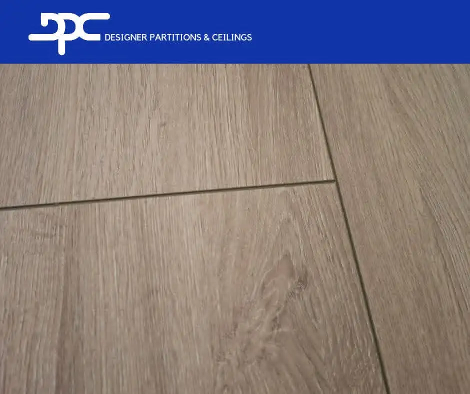 Close view of laminated flooring installed by Designer Partitions and Ceilings