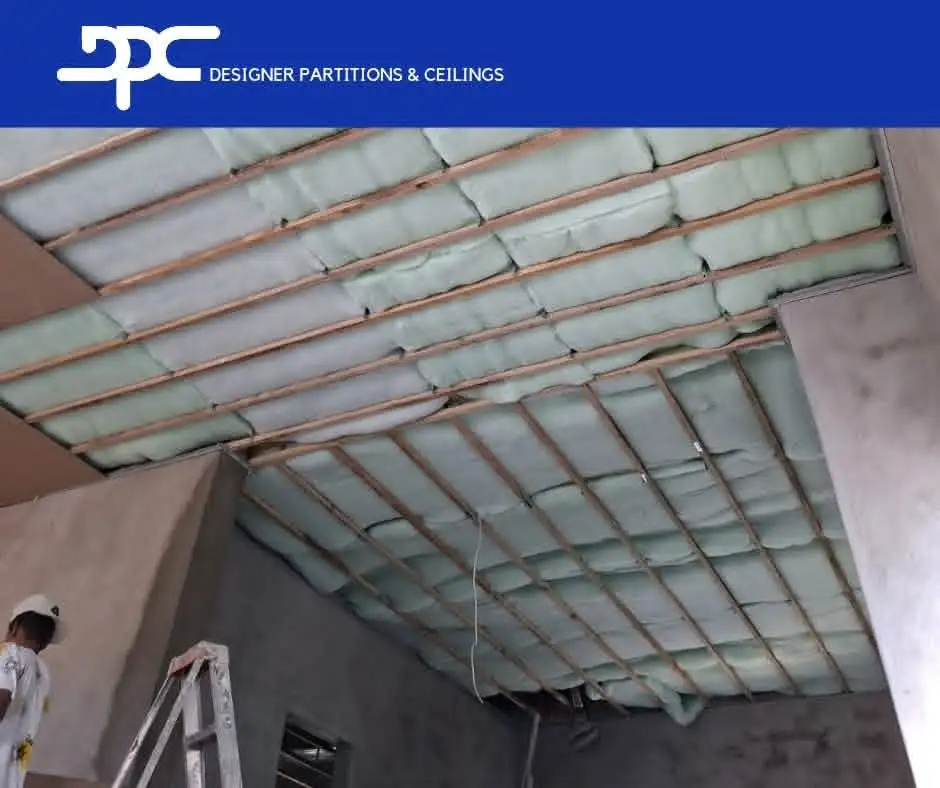 Insulation work showing installed ceiling insulation material